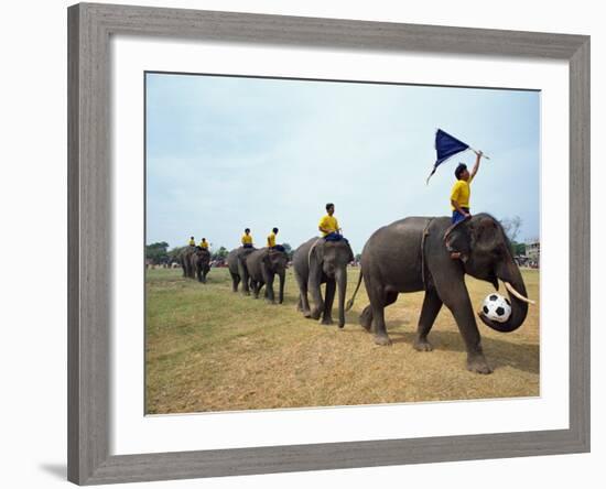 Line of Elephants in a Soccer Team During November Elephant Round-Up Festival, Surin City, Thailand-Alain Evrard-Framed Photographic Print