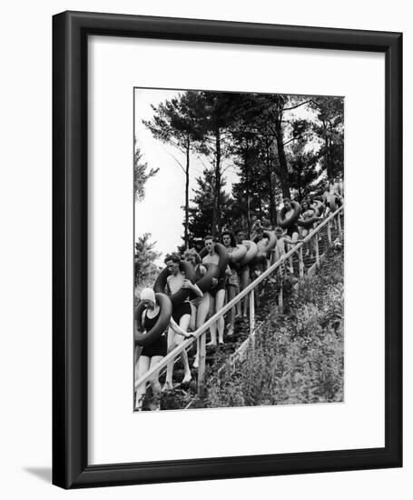 Line of Fun Seekers with Inner Tubes Descending Staircase to Pier for Floating Party on Apple River-Alfred Eisenstaedt-Framed Photographic Print