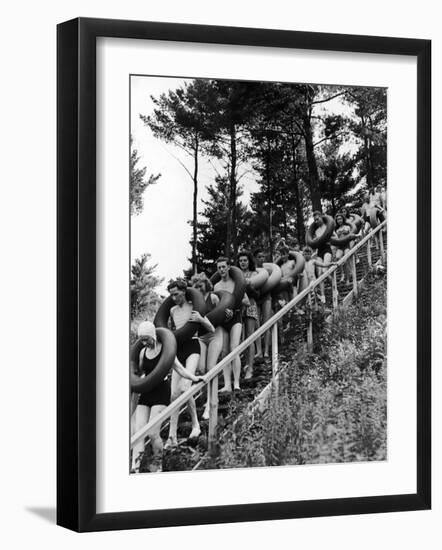 Line of Fun Seekers with Inner Tubes Descending Staircase to Pier for Floating Party on Apple River-Alfred Eisenstaedt-Framed Photographic Print