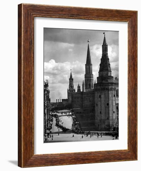 Line of Russians Along Street in Front of the Kremlin-Margaret Bourke-White-Framed Photographic Print