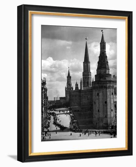 Line of Russians Along Street in Front of the Kremlin-Margaret Bourke-White-Framed Photographic Print