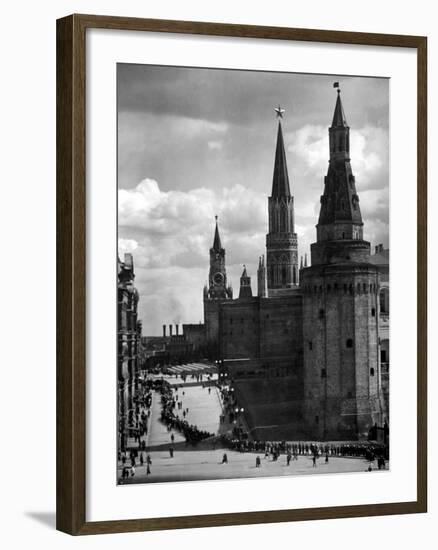 Line of Russians Along Street in Front of the Kremlin-Margaret Bourke-White-Framed Photographic Print