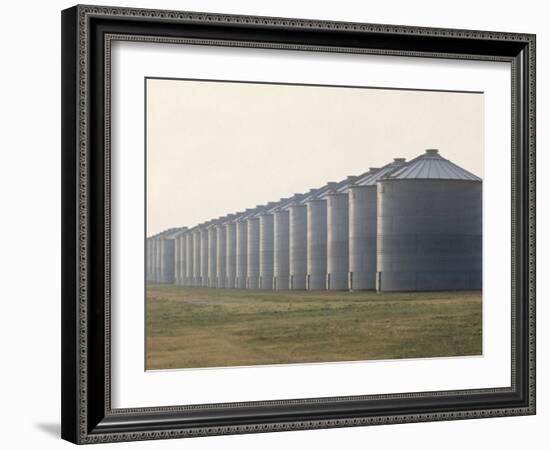 Line of Storage Bins for Corn, Unidentified Section of the Mid-West-John Zimmerman-Framed Photographic Print