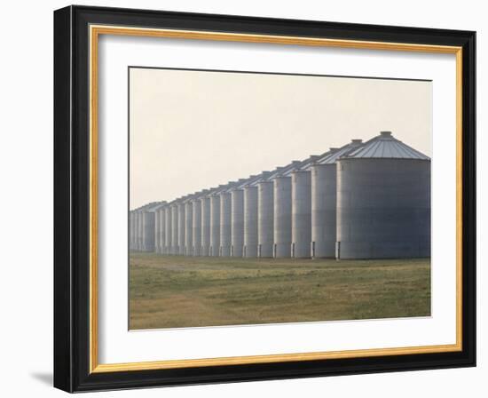 Line of Storage Bins for Corn, Unidentified Section of the Mid-West-John Zimmerman-Framed Photographic Print