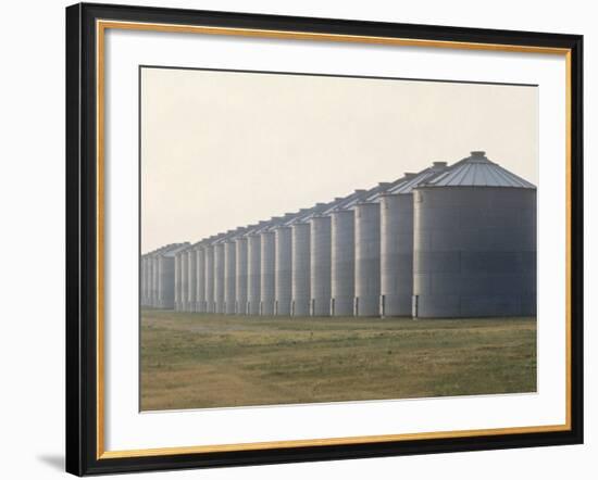 Line of Storage Bins for Corn, Unidentified Section of the Mid-West-John Zimmerman-Framed Photographic Print