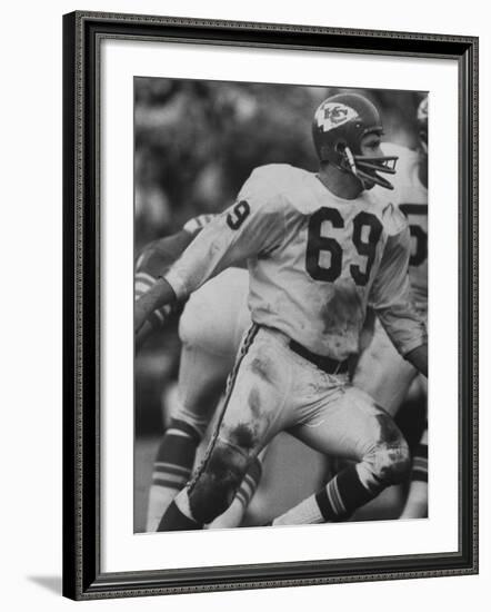 Linebacker for Kansas City Chiefs Sherrill Headrick in Action-null-Framed Premium Photographic Print