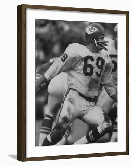 Linebacker for Kansas City Chiefs Sherrill Headrick in Action-null-Framed Premium Photographic Print