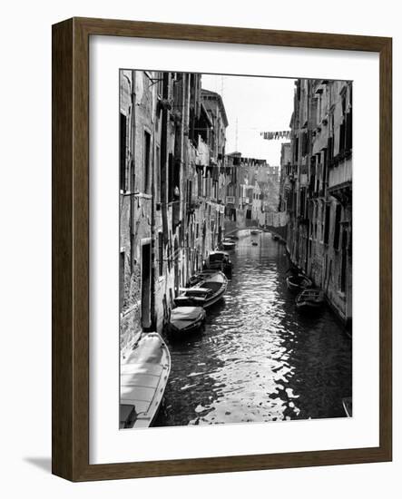 Lines of Laundry Hang Between Residential Buildings-null-Framed Photographic Print