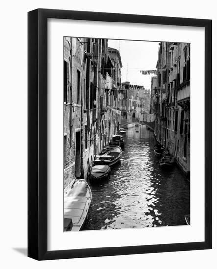 Lines of Laundry Hang Between Residential Buildings-null-Framed Photographic Print