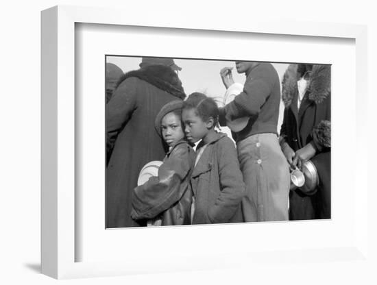 Lining up for food at mealtime in the camp for flood refugees, Forrest City, Arkansas, 1937-Walker Evans-Framed Photographic Print