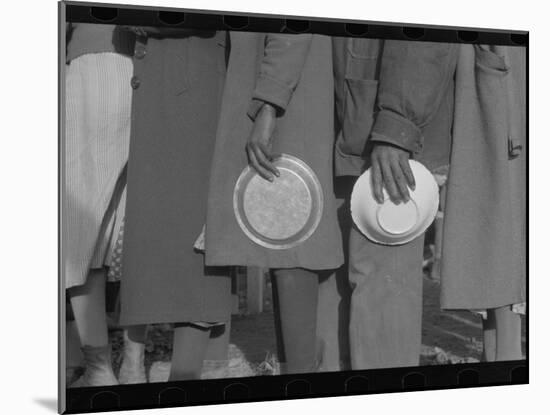 Lining up for food at mealtime in the camp for flood refugees, Forrest City, Arkansas, 1937-Walker Evans-Mounted Photographic Print