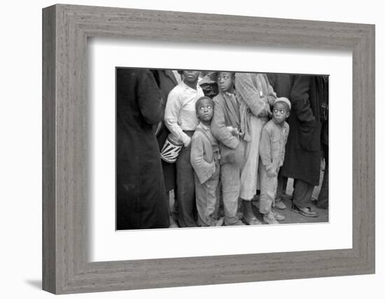 Lining up for food at mealtime in the camp for flood refugees, Forrest City, Arkansas, 1937-Walker Evans-Framed Photographic Print