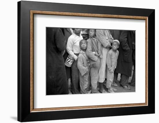 Lining up for food at mealtime in the camp for flood refugees, Forrest City, Arkansas, 1937-Walker Evans-Framed Photographic Print