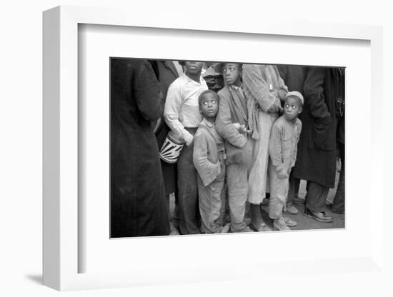 Lining up for food at mealtime in the camp for flood refugees, Forrest City, Arkansas, 1937-Walker Evans-Framed Photographic Print