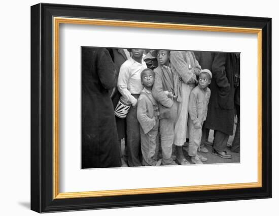 Lining up for food at mealtime in the camp for flood refugees, Forrest City, Arkansas, 1937-Walker Evans-Framed Photographic Print