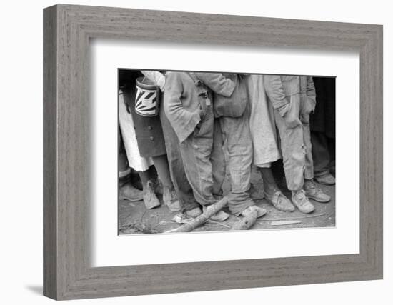 Lining up for food at mealtime in the camp for flood refugees in Forrest City, Arkansas, 1937-Walker Evans-Framed Photographic Print