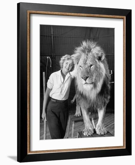 Lion Tamer Judy Allen, Standing Beside Her Beloved Lion Friend-Loomis Dean-Framed Photographic Print