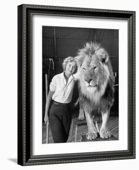 Lion Tamer Judy Allen, Standing Beside Her Beloved Lion Friend-Loomis Dean-Framed Photographic Print