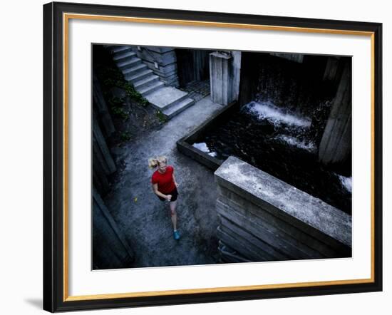 Lisa Eaton Goes for an Early Morning Run in Freeway Park - Seattle, Washington-Dan Holz-Framed Photographic Print