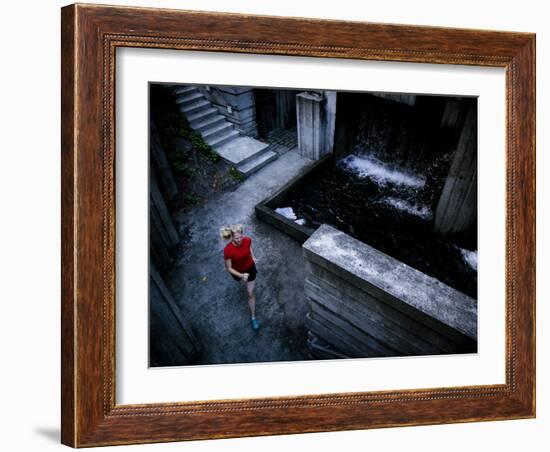 Lisa Eaton Goes for an Early Morning Run in Freeway Park - Seattle, Washington-Dan Holz-Framed Photographic Print