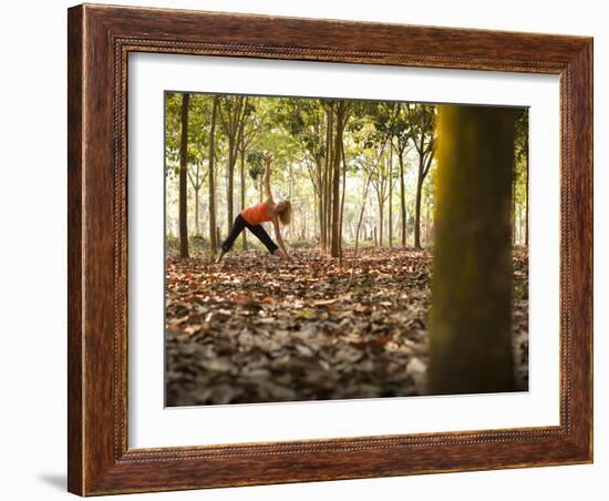 Lisa Eaton Takes Her Yoga Practice to a Rubber Tree Plantation in Chiang Dao, Thaialand-Dan Holz-Framed Photographic Print