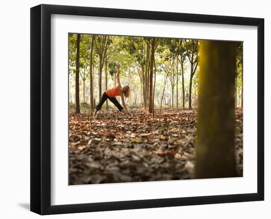 Lisa Eaton Takes Her Yoga Practice to a Rubber Tree Plantation in Chiang Dao, Thaialand-Dan Holz-Framed Photographic Print