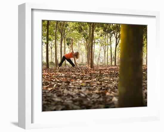 Lisa Eaton Takes Her Yoga Practice to a Rubber Tree Plantation in Chiang Dao, Thaialand-Dan Holz-Framed Photographic Print
