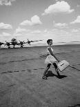 American Airline Hostess Crossing Field on Way to Jobs as a Model and Sales Clerk at Neiman Marcus-Lisa Larsen-Photographic Print