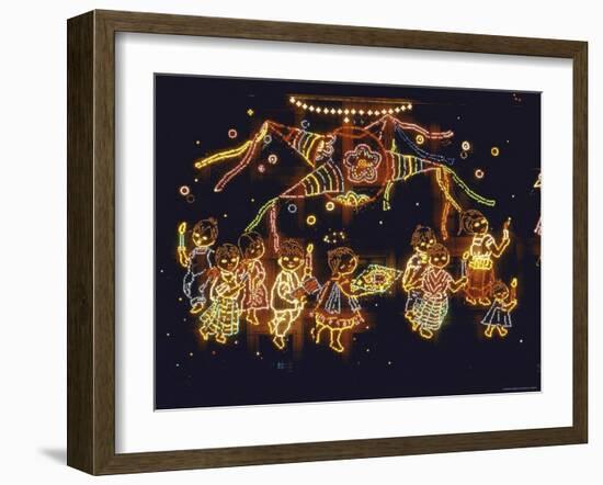Lit Display of Traditional Pinata and Children in Candlelight Procession During Christmas Festival-John Dominis-Framed Photographic Print