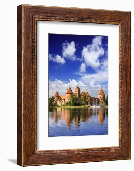 Lithuania, Vilnius. Trakai Castle reflected Galve lake in Lithuania-Miva Stock-Framed Photographic Print