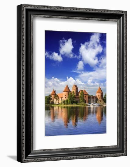 Lithuania, Vilnius. Trakai Castle reflected Galve lake in Lithuania-Miva Stock-Framed Photographic Print