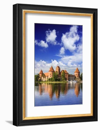 Lithuania, Vilnius. Trakai Castle reflected Galve lake in Lithuania-Miva Stock-Framed Photographic Print