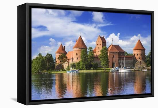 Lithuania, Vilnius. Trakai Castle reflected in Galve lake-Miva Stock-Framed Premier Image Canvas