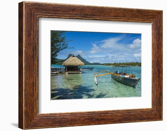 Little boat anchoring on a small Motu, Bora Bora, Society Islands, French Polynesia, Pacific-Michael Runkel-Framed Photographic Print