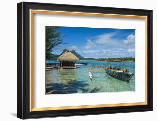 Little boat anchoring on a small Motu, Bora Bora, Society Islands, French Polynesia, Pacific-Michael Runkel-Framed Photographic Print