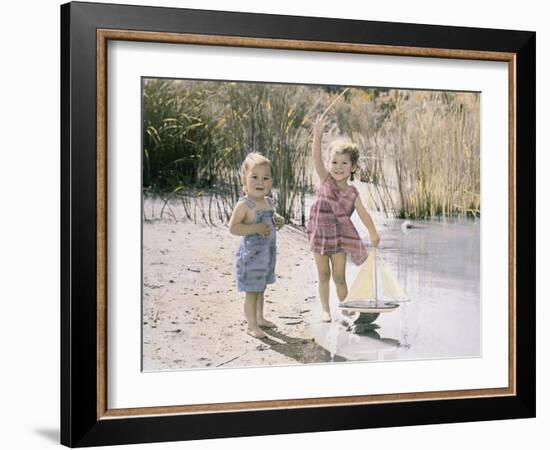 Little Boy and Girl Playing with Toy Sail Boat-Nora Hernandez-Framed Giclee Print