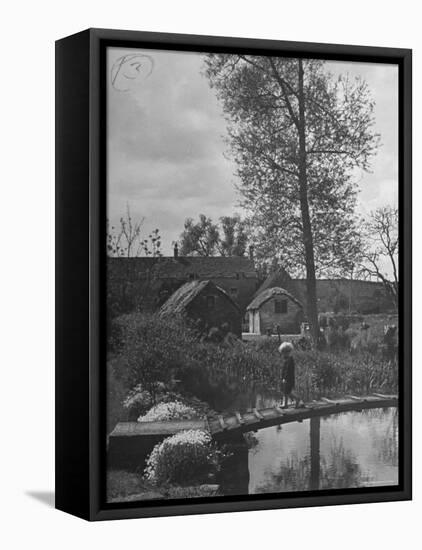 Little Boy Crossing the Bridge over the Stream at Winson Mill Farm, A War Nursery-Hans Wild-Framed Premier Image Canvas