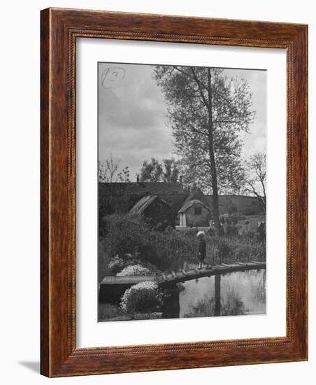 Little Boy Crossing the Bridge over the Stream at Winson Mill Farm, A War Nursery-Hans Wild-Framed Photographic Print