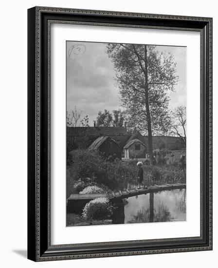 Little Boy Crossing the Bridge over the Stream at Winson Mill Farm, A War Nursery-Hans Wild-Framed Photographic Print