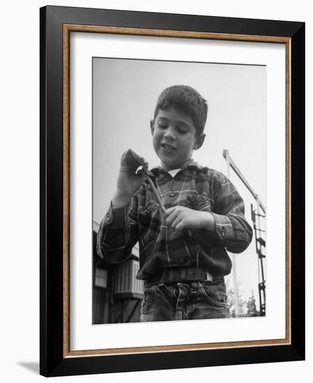 Little Boy Holding His New Pet Snake-Carl Mydans-Framed Photographic Print