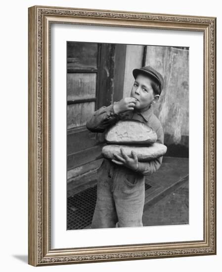 Little Boy Holding Loaves of Bread-Walter Sanders-Framed Photographic Print