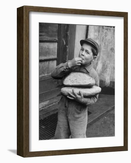 Little Boy Holding Loaves of Bread-Walter Sanders-Framed Photographic Print