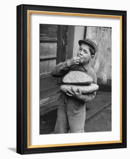 Little Boy Holding Loaves of Bread-Walter Sanders-Framed Photographic Print