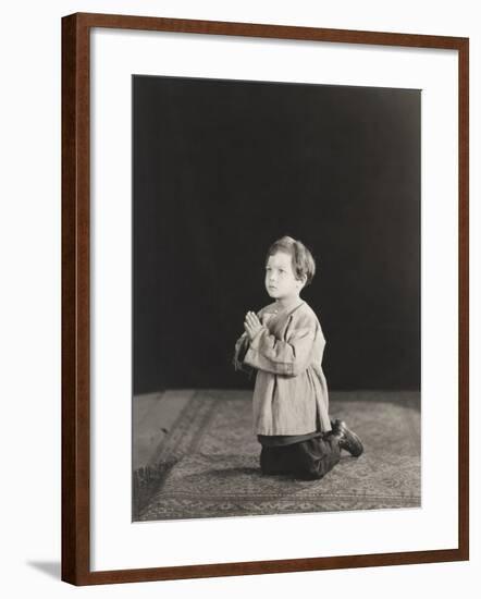 Little Boy Kneeling in Prayer-null-Framed Photo