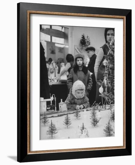 Little Boy Looking at Train Set in Moscow Department Store-James Whitmore-Framed Photographic Print