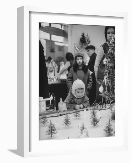 Little Boy Looking at Train Set in Moscow Department Store-James Whitmore-Framed Photographic Print