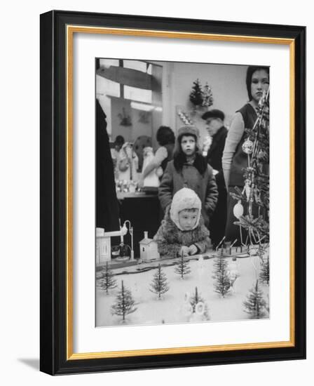 Little Boy Looking at Train Set in Moscow Department Store-James Whitmore-Framed Photographic Print