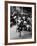 Little Boy on Merry Go Round at the Tuileries Gardens, Sticking Out His Tongue-Alfred Eisenstaedt-Framed Photographic Print