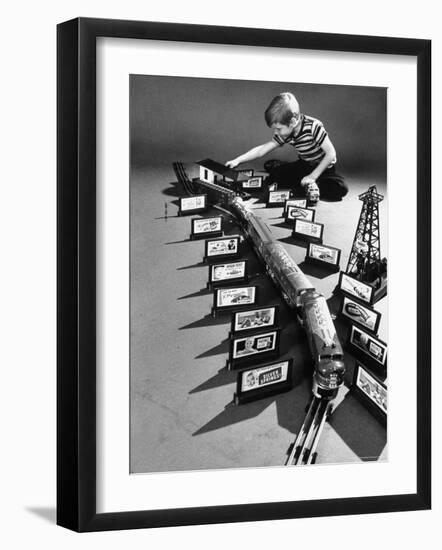 Little Boy Playing with a Toy Train and Billboard Set-Walter Sanders-Framed Photographic Print