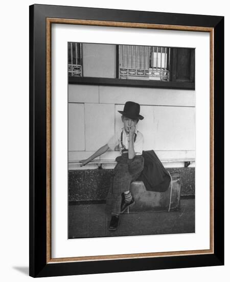 Little Boy Sitting on His Luggage While Waiting For the Train at the Denver Union Station-Sam Shere-Framed Photographic Print